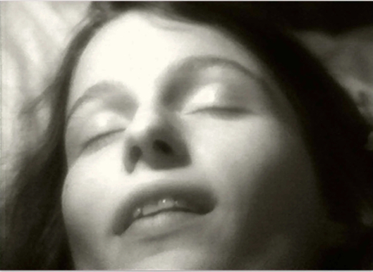 woman with eyes closed